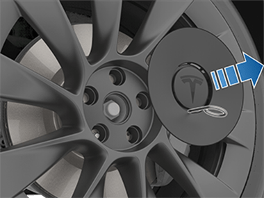 将轮毂螺母工具向外拉，以将轮毂螺母罩拆下